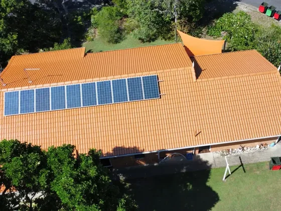 Aerial view of a tiled roof ready for conversion to metal roofing
