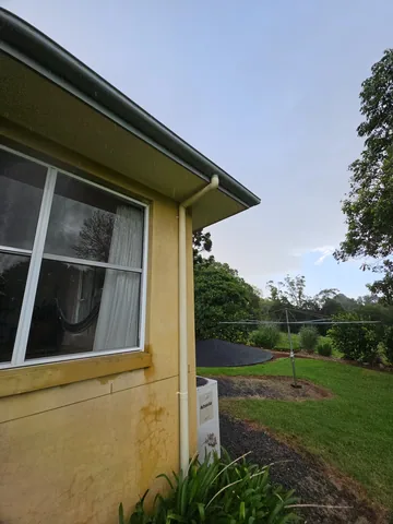 Guttering on a rendered home with rural Northern Rivers views